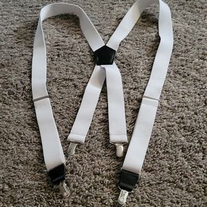 White and black suspenders with silver accents